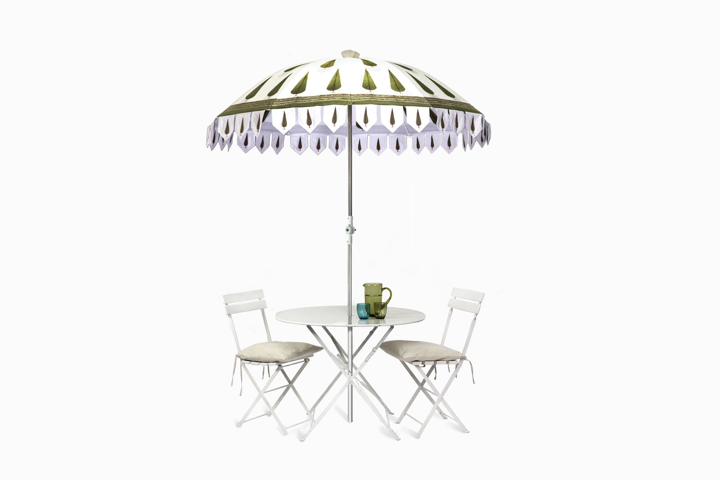 Raj Tent Club | Rentals | Parasols & Deckchairs Cypress parasol with bistro table and