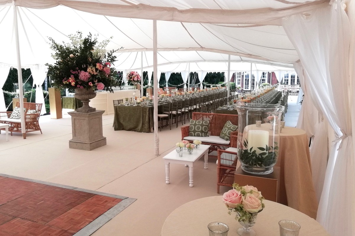 Partial view of the dance floor and out Colonial Rattan furniture in a plain cream Quintuple Maharaja