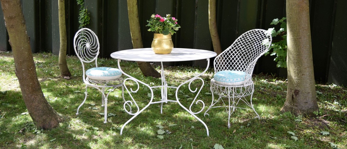 2 white metal regency garden chairs and table