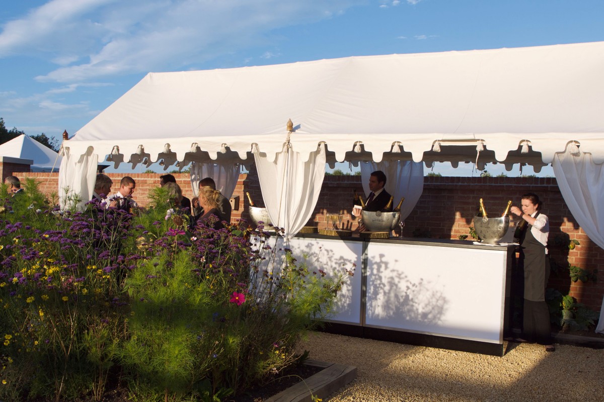 A Long Pergola used as a Champagne bar at Chewton Glen Hotel