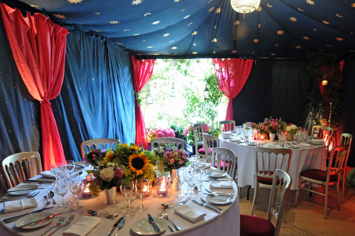 Colourful Metal Frame Raj Tent at a private party in Scotland
