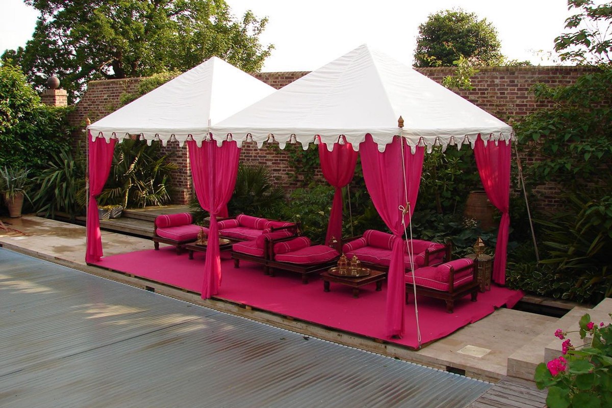 A pair of two hot pink 2.8m Pergolas