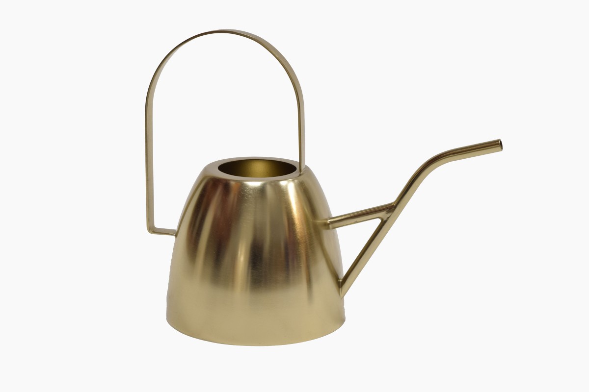 Polished gold metal watering can