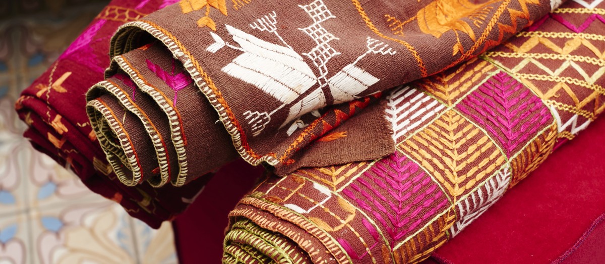 Header shot fabrics throws