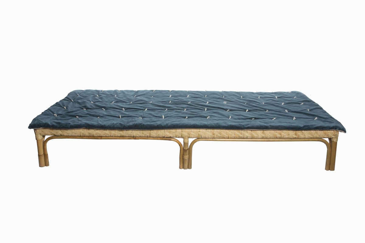 Rattan daybed with velvet throw