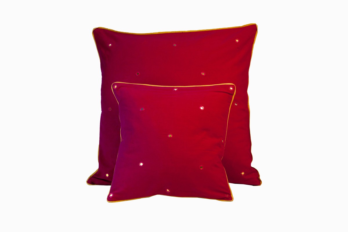 Red cotton cushions with gold sequins