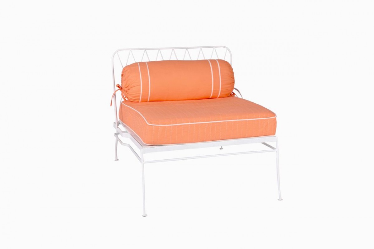 Palm Springs white metal chair, soft orange cushions
