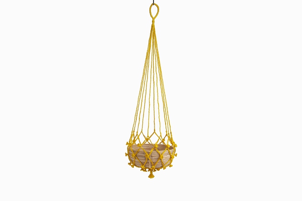 Yellow string and cane hanging basket
