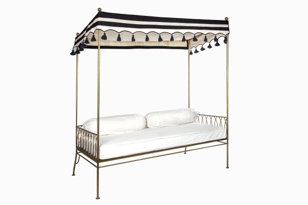 Palm Springs daybed gold with black and white striped and tasseled canopy