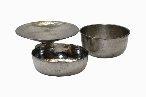 Assorted beaten metal bowls