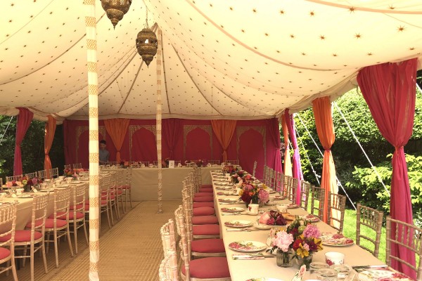 A Single Maharaja with pink golden arch walls