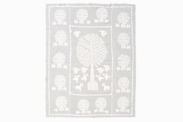 White cotton cut out bedspread tree of life design
