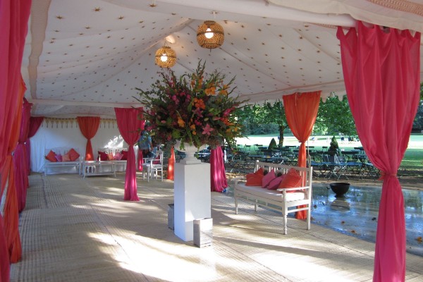 Interior of a triple metal frame Raj Tent in Battersea Park, London