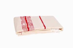 Moroccan red and cream stripe wool bedspread folded