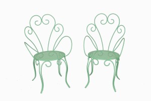 A pair of vintage French bistro chairs