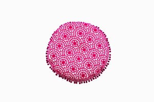 Magenta pom pom cushion