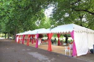 A triple metal frame Raj Tent in Battersea Park, London