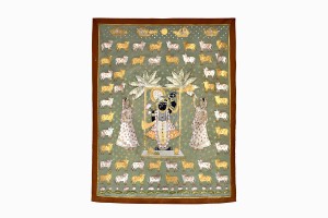hand painted pichwai depicting lord krishna with female attendants (gopis) and holy cows