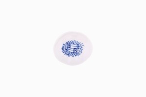 Tiny porcelain dish with blue fishes
