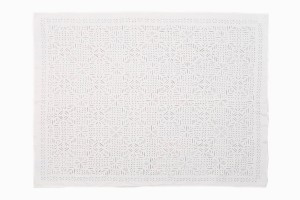 White cotton cut out bedspread geometric design