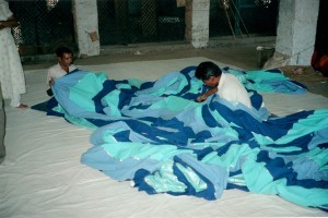 Hand stitching a tent ceiling lining