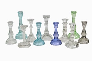 Mismatching glass candlesticks