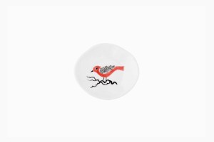 Tiny dish with red bird