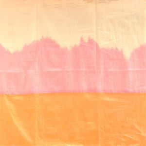 Shaded peach pink orange drape