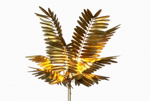 Gold metal palm tree standard lamp close up