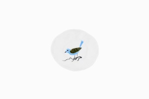 Tiny porcelain dish with dark green and blue bird