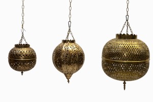 Three pierced filigree globe lanterns