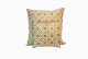Cream cushions with gold geometric flowers